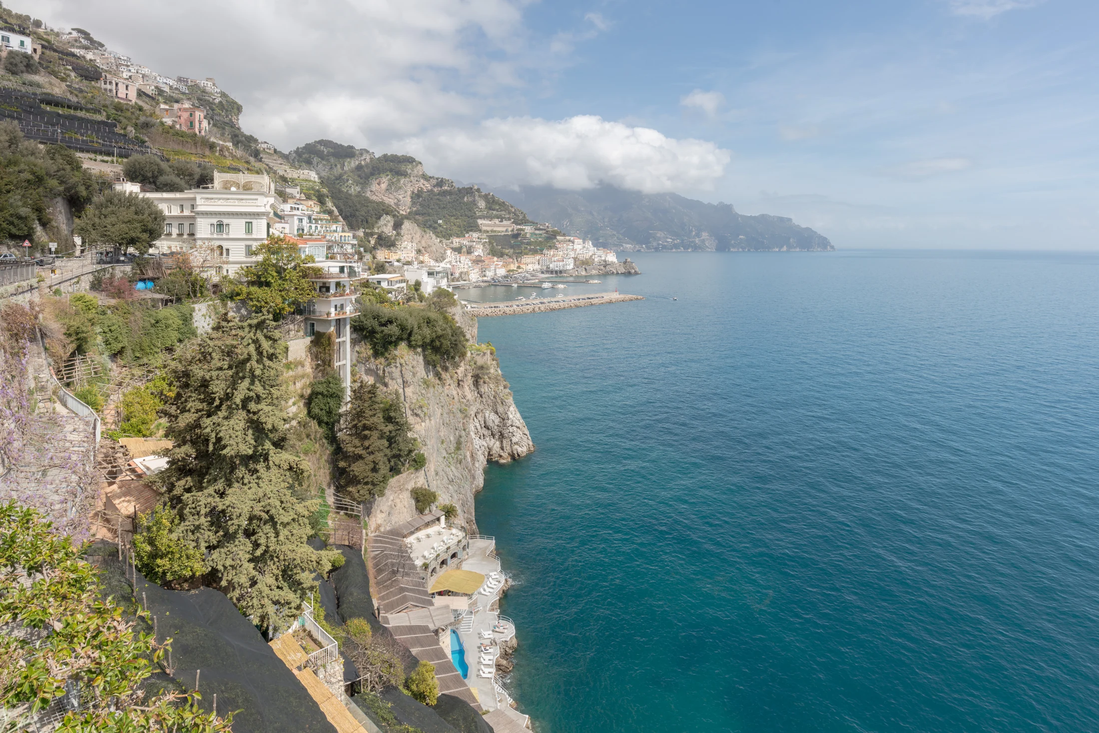 Colourful coastal buildings overlooking the sea in Amalfi, Italy